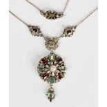 A foil backed garnet, foil backed emerald, cultured pearl and enamelled pendant necklace, probably