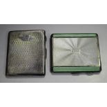 A George V silver and enamelled engine turned rectangular cigarette case, the front with white and