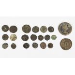 A group of fourteen Roman bronze coins, including a Domitian brass sestertius, and seven further