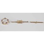 A gold, amethyst and seed pearl brooch of circlet form, diameter 2.3cm, a gold and gem set navy