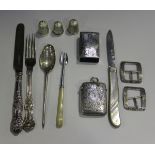 A late Victorian silver rectangular vesta case with engraved decoration, Birmingham 1898, three