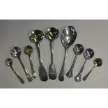 A small group of silver flatware, comprising a pair of Victorian fiddle pattern salt spoons,