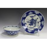 A Chinese blue and white porcelain circular dish, late 19th century, painted with a central panel of