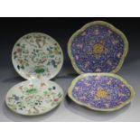 A pair of Chinese famille rose enamelled blue ground porcelain footed dishes, mark of Jiaqing but