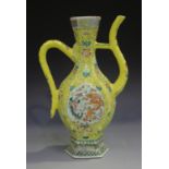 A Chinese famille rose enamelled yellow ground porcelain ewer, late Qing dynasty, of hexagonal