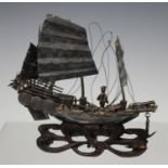 A Chinese silver model of a gunboat by Wang Hing, early 20th century, modelled with three-masted