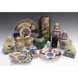 A group of Japanese Imari porcelain, Meiji period, comprising a pair of ovoid jars and domed covers,