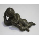 A Chinese Ming style brown patinated bronze figural scroll weight, possibly 18th century, modelled