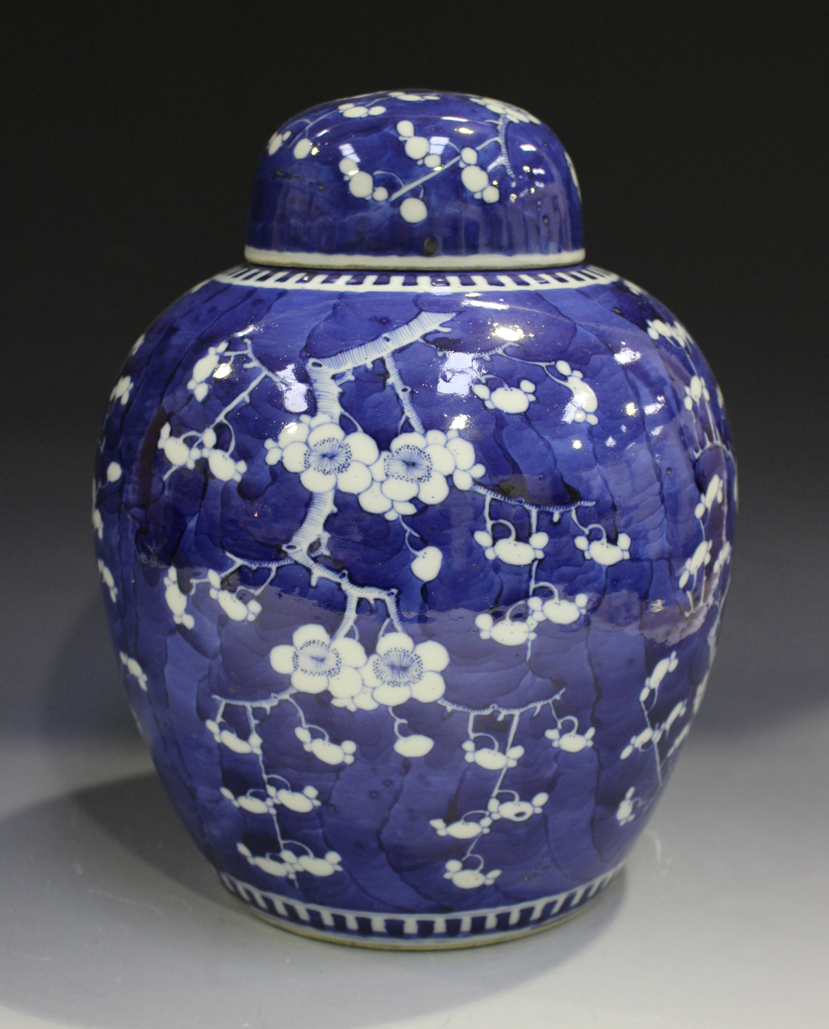 A Chinese blue and white porcelain ginger jar and cover, mark of Kangxi but late 19th century,