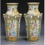 A pair of Chinese Canton famille rose porcelain vases, mid to late 19th century, each shouldered