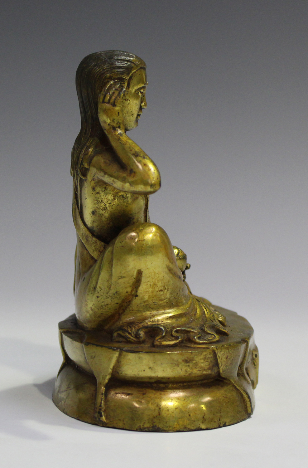 A Sino-Tibetan gilt bronze bodhisattva, probably 20th century, modelled seated on an oval throne, - Image 8 of 8