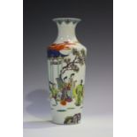 A Chinese famille rose porcelain vase, late Qing dynasty, the tapering cylindrical body painted with