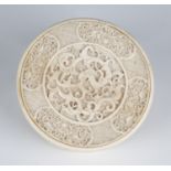 A Chinese ivory circular box and cover, Qing dynasty, possibly from the Peking Palace workshops, the