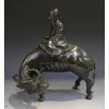 A Chinese brown patinated bronze censer and cover, late Ming dynasty, modelled as a sage seated on