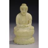 A Japanese carved ivory Buddha, early 20th century, modelled seated on a double lotus throne, height