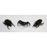 A group of three South-east Asian brown patinated bronze figures, modern, comprising a crab,