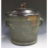 A Chinese brown patinated bronze jar, Qing dynasty, of tapered cylindrical form flanked by a pair of