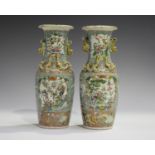 A pair of Chinese famille rose porcelain vases, late 19th century, each shouldered tapering body and
