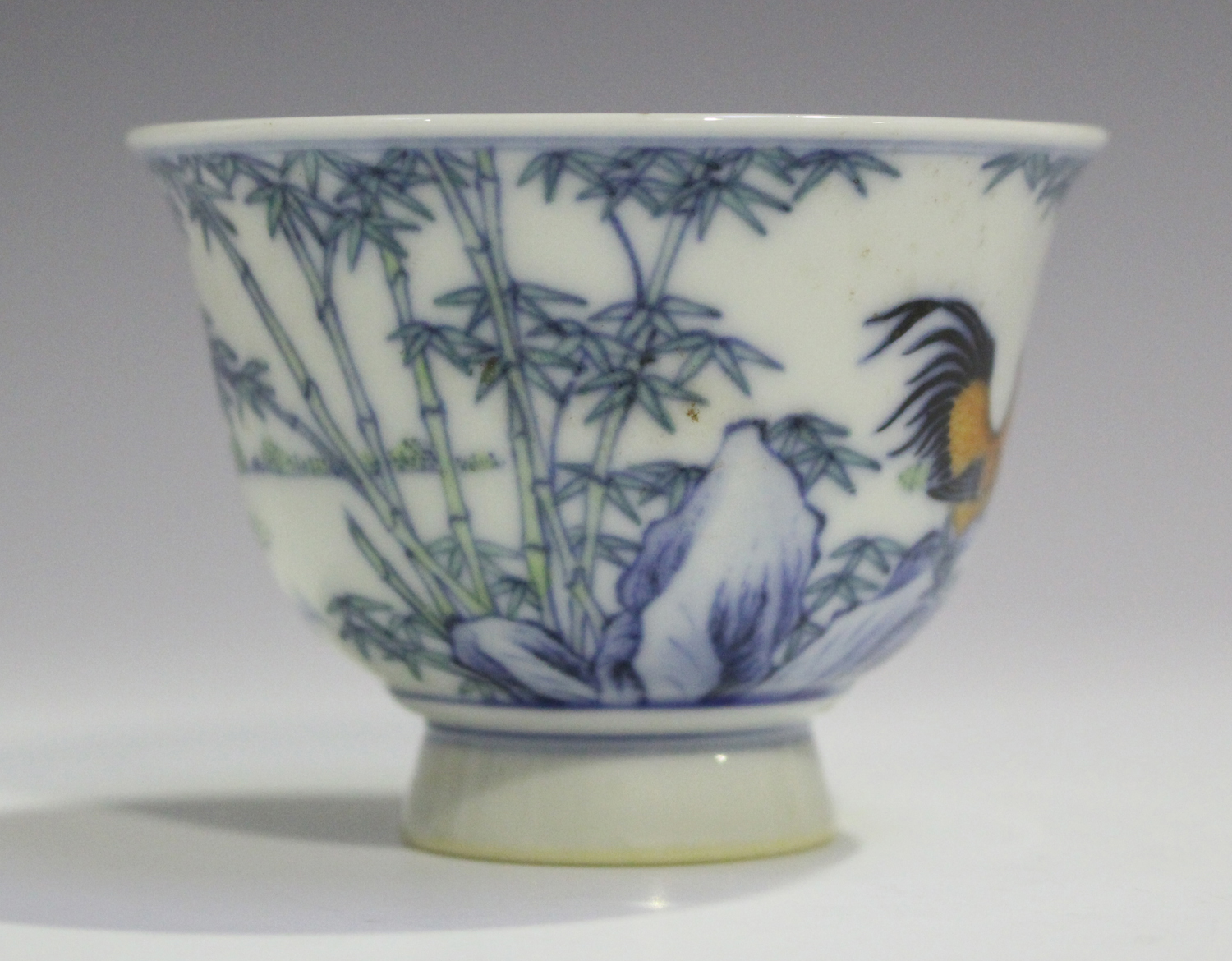 A Chinese doucai porcelain footed cup, mark of Yongzheng but modern, the exterior painted with a - Image 4 of 6