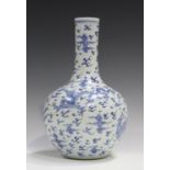 A Chinese blue and white porcelain bottle vase, painted with dragons and phoenixes amidst clouds and