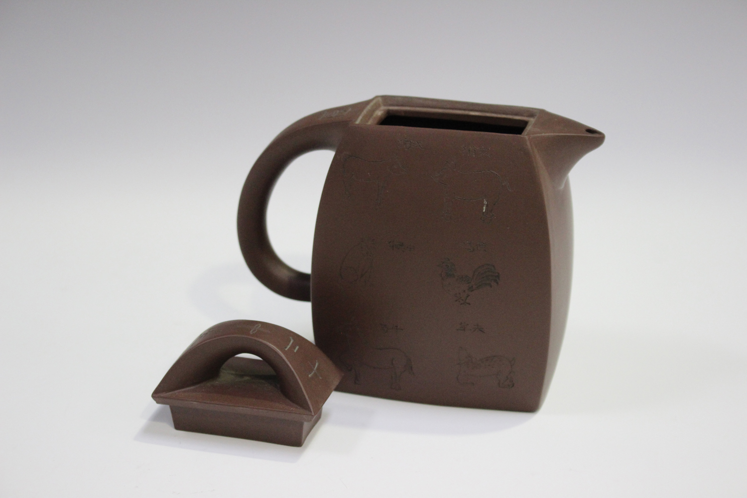 A Chinese Yixing stoneware teapot and cover, late 20th century, of swollen rectangular form, incised - Image 7 of 11