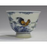 A Chinese doucai porcelain footed cup, mark of Yongzheng but modern, the exterior painted with a