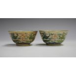 A pair of Chinese armorial porcelain circular bowls, Jiaqing period, each salmon/apricot ground