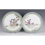 A pair of Chinese famille rose porcelain circular dishes, mark of Qianlong but probably Republic