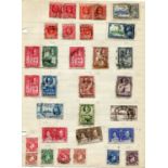 A world stamp collection in twelve albums and some loose sorted into packets, including Great