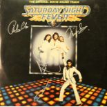 AUTOGRAPHS. A 'Saturday Night Fever' soundtrack vinyl LP signed by John Travolta and all three Bee