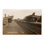 A photographic postcard titled 'Wivelsfield Station', showing the platform and tracks at the West