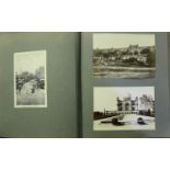 PHOTOGRAPHS. An album of approximately 103 mounted black and white photographs of Indian scenes,