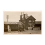 A collection of 15 photographic postcards of Crawley, West Sussex, including a postcard of figures