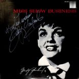 AUTOGRAPHS. A 'Miss Show Business' vinyl LP sleeve signed by Judy Garland to the sleeve, 31.5cm x