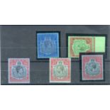 A collection of Bermuda stamps from 1922 with 1924 to 32 high values mint, three 10 shillings 12/