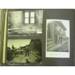 PHOTOGRAPHS. An album of approximately 135 black and white photographs and postcards of German