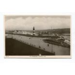 A large collection of postcards in 15 albums, including British and foreign topographical views,