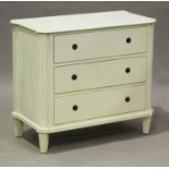 A modern French style cream painted chest of three drawers, height 81cm, width 90cm, depth 45cm.
