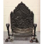 A cast iron fireback decorated in relief with a court scene, 82cm x 60cm, together with a pair of