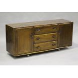 An Ercol stained elm sideboard fitted with drawers and cupboards, height 69cm, width 155cm, depth