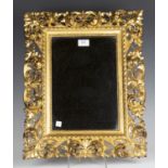 A late 19th century Florentine giltwood rectangular wall mirror, 52.5cm x 42cm (some minor