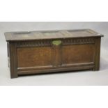 A late 17th century panelled oak coffer, the lid with original wire hinges, height 53cm, width