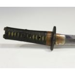 A Meiji period Japanese wakizashi with curved single-edged blade, blade length 38cm, the tang