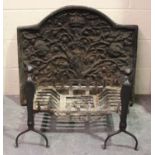 A cast iron fireback decorated in relief with an oak tree above a royal 'CR' cypher, 73cm x 86cm,