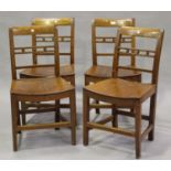 A set of four 19th century provincial ash and elm bar back dining chairs with solid panel seats,