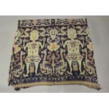 A Sumba ikat panel, Indonesia, early/mid-20th century, decorated with six ancestral figures on a