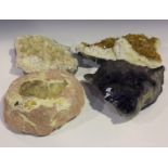 A group of four large mineral specimens, comprising a formation of citrine, length 41cm, a section