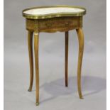 A late 20th century French kingwood kidney shaped occasional table with an inset marble top and gilt