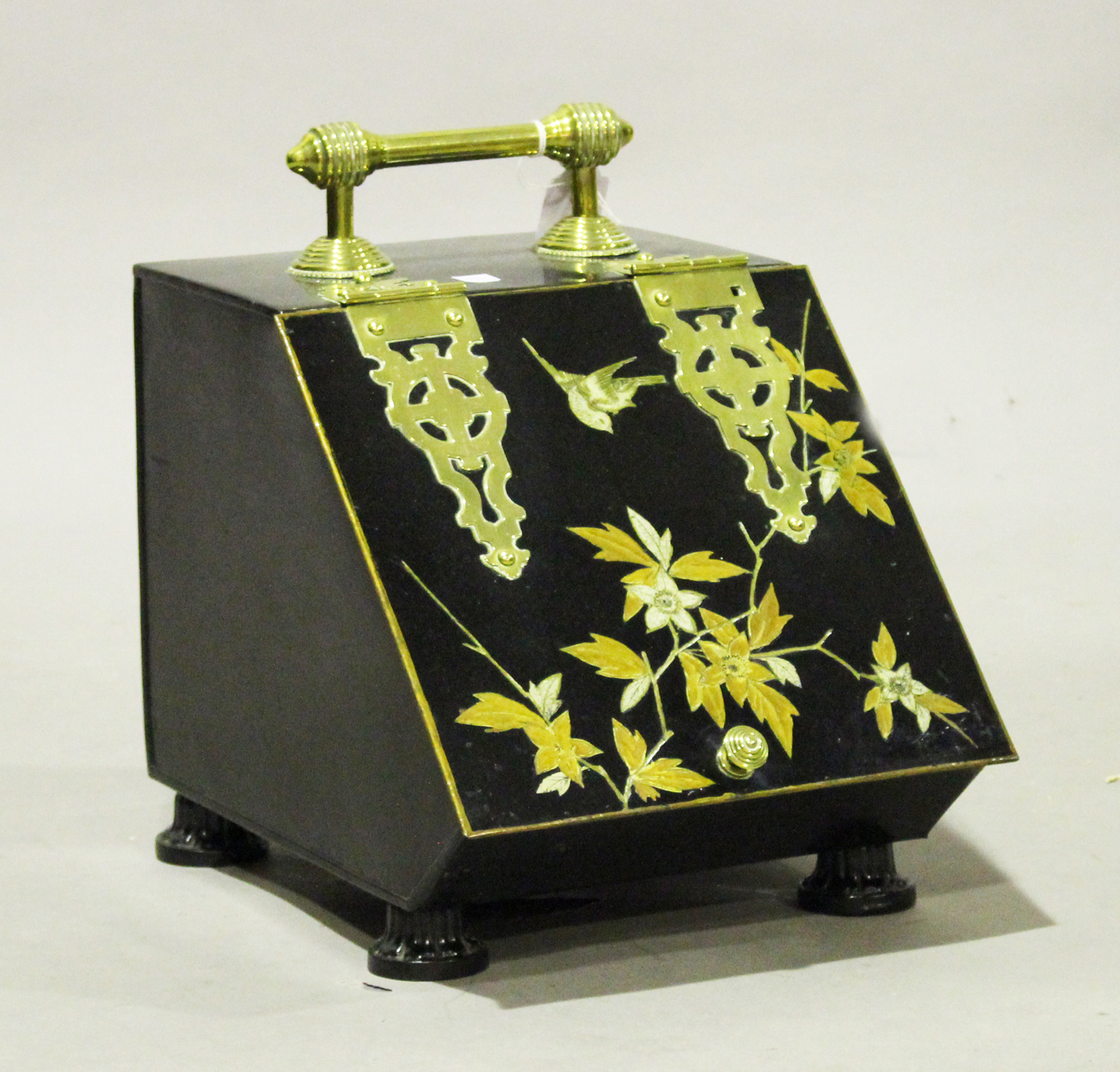 A late Victorian Aesthetic Movement tole painted and brass mounted coal purdonium, the hinged lid