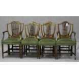 A set of eight Edwardian Neoclassical Revival mahogany and inlaid shield back dining chairs,